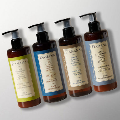 4 bottles of DAMANA hotel toiletries.