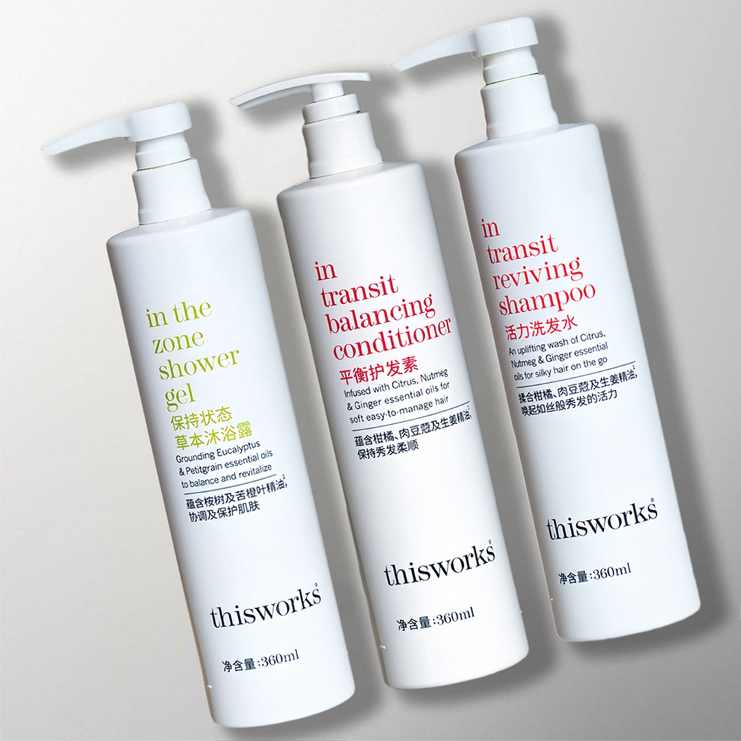 3 bottles of thisworks hotel toiletries.