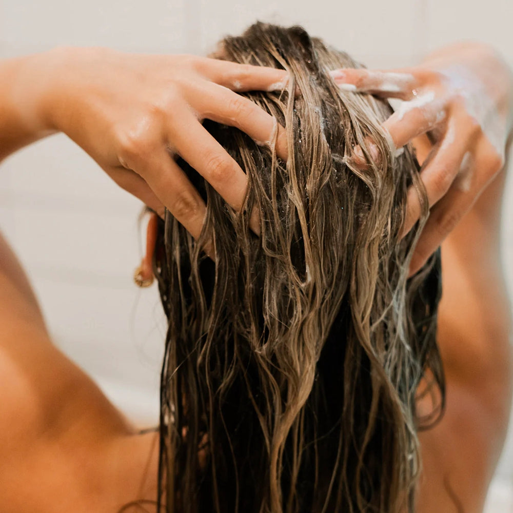 Lady washing her hair